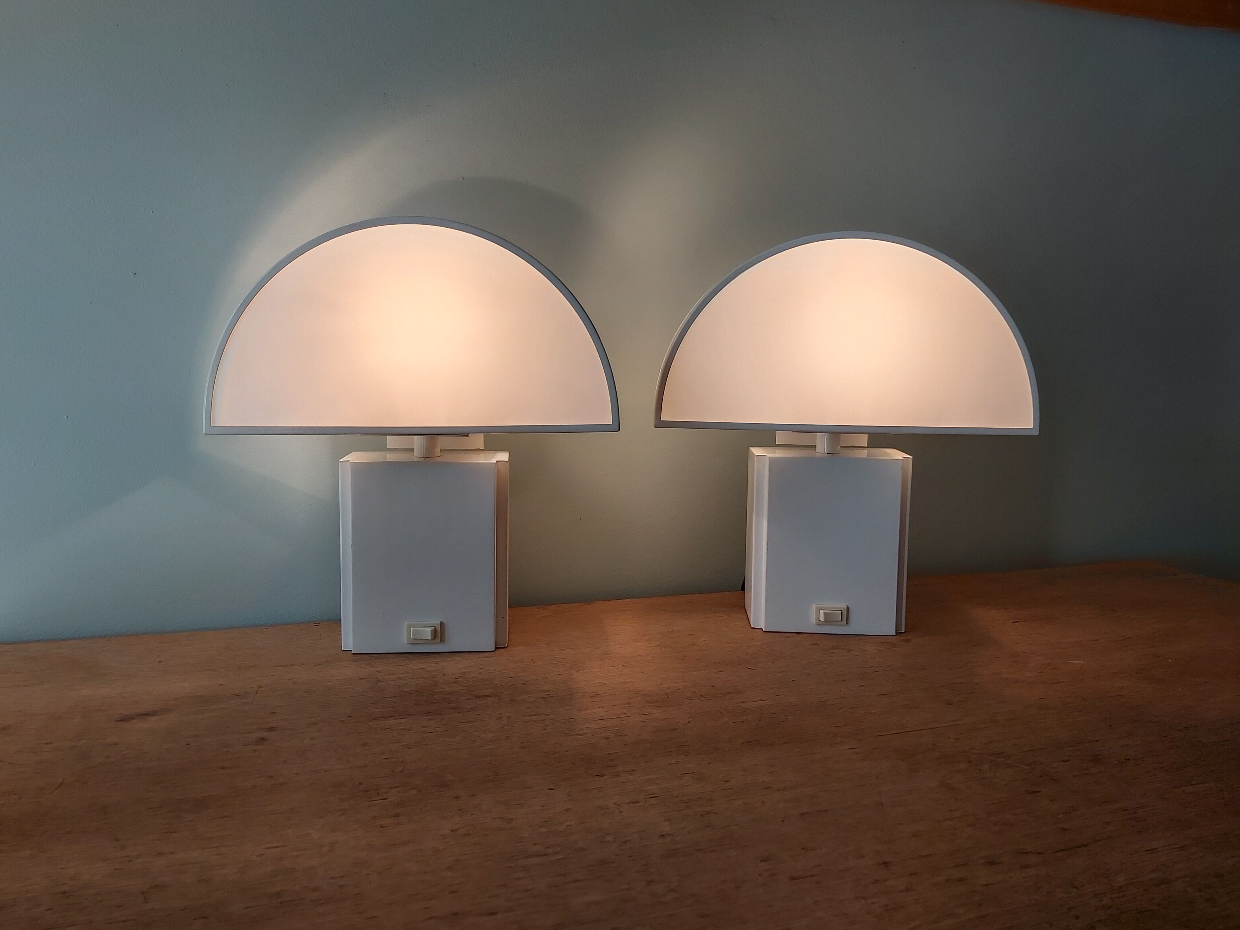 Pair of wall lamps, Olympus model, Harvey Guzzini, 70s