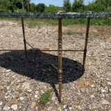 Oval coffee table in veined green marble