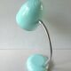 Articulated desk lamp, in turquoise blue metal, 1970s.