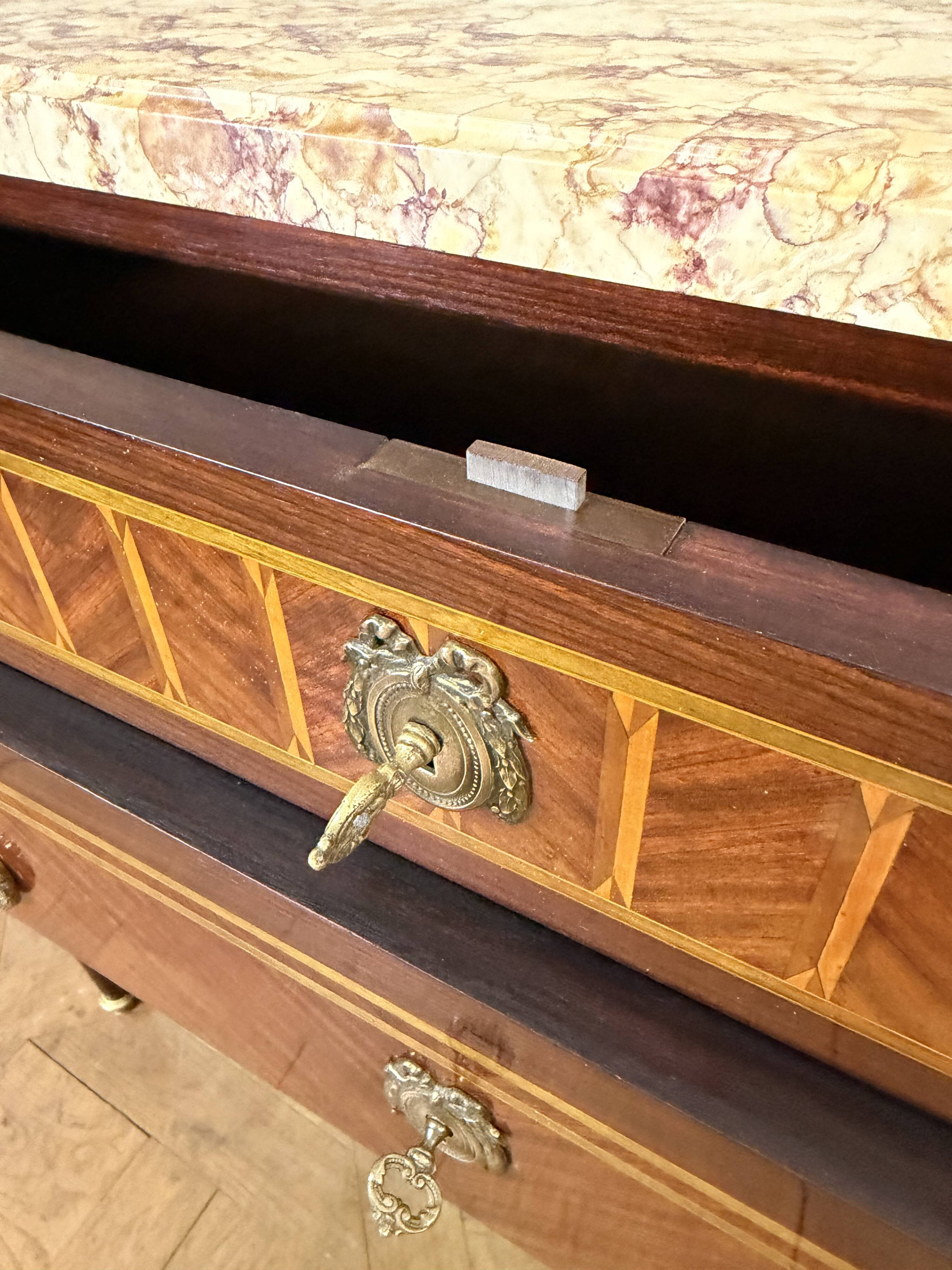 Louis XVI commode from the late 19th century.