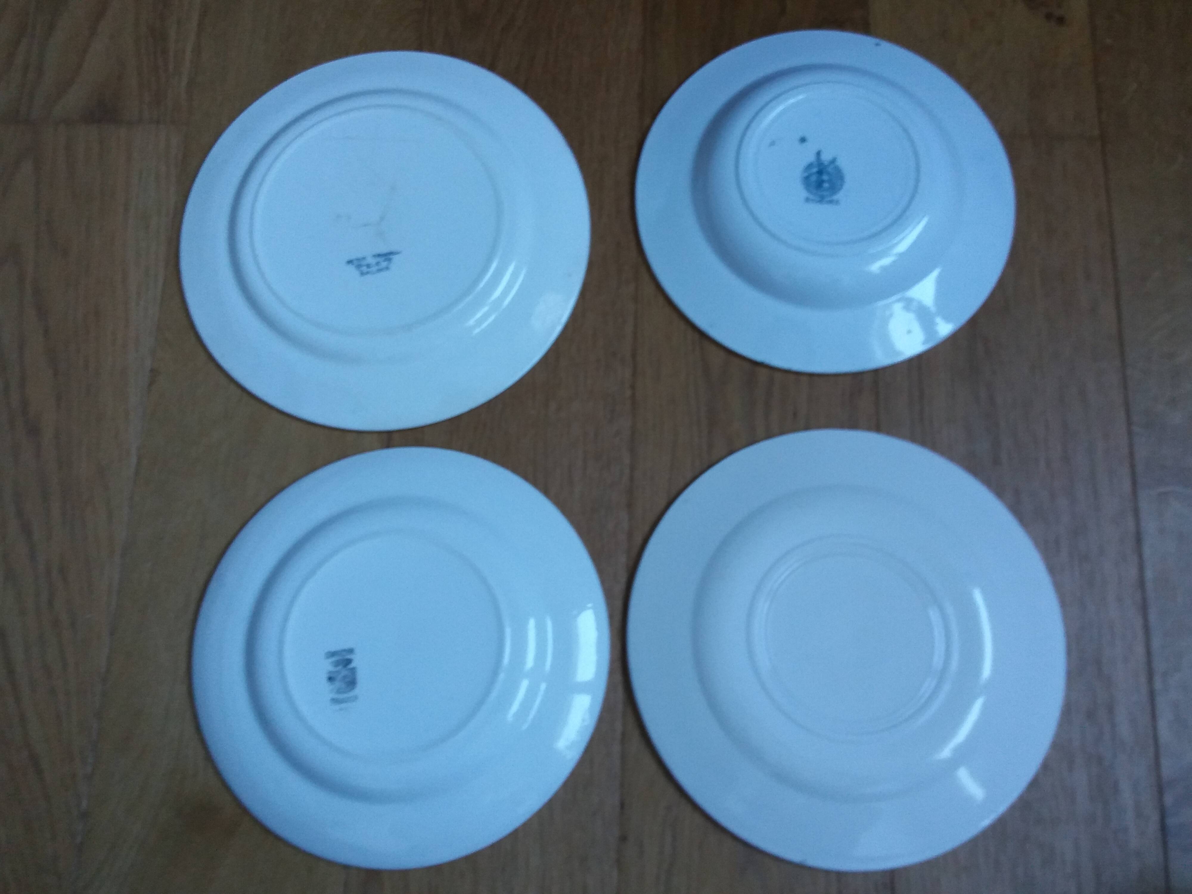 Old green and blue mismatched plates from Digoin, Salins, Moulin des Loups