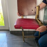 Strapontin armchair showroom