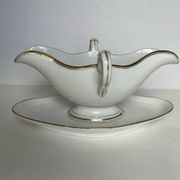 Saucière ancienne en porcelaine de Paris