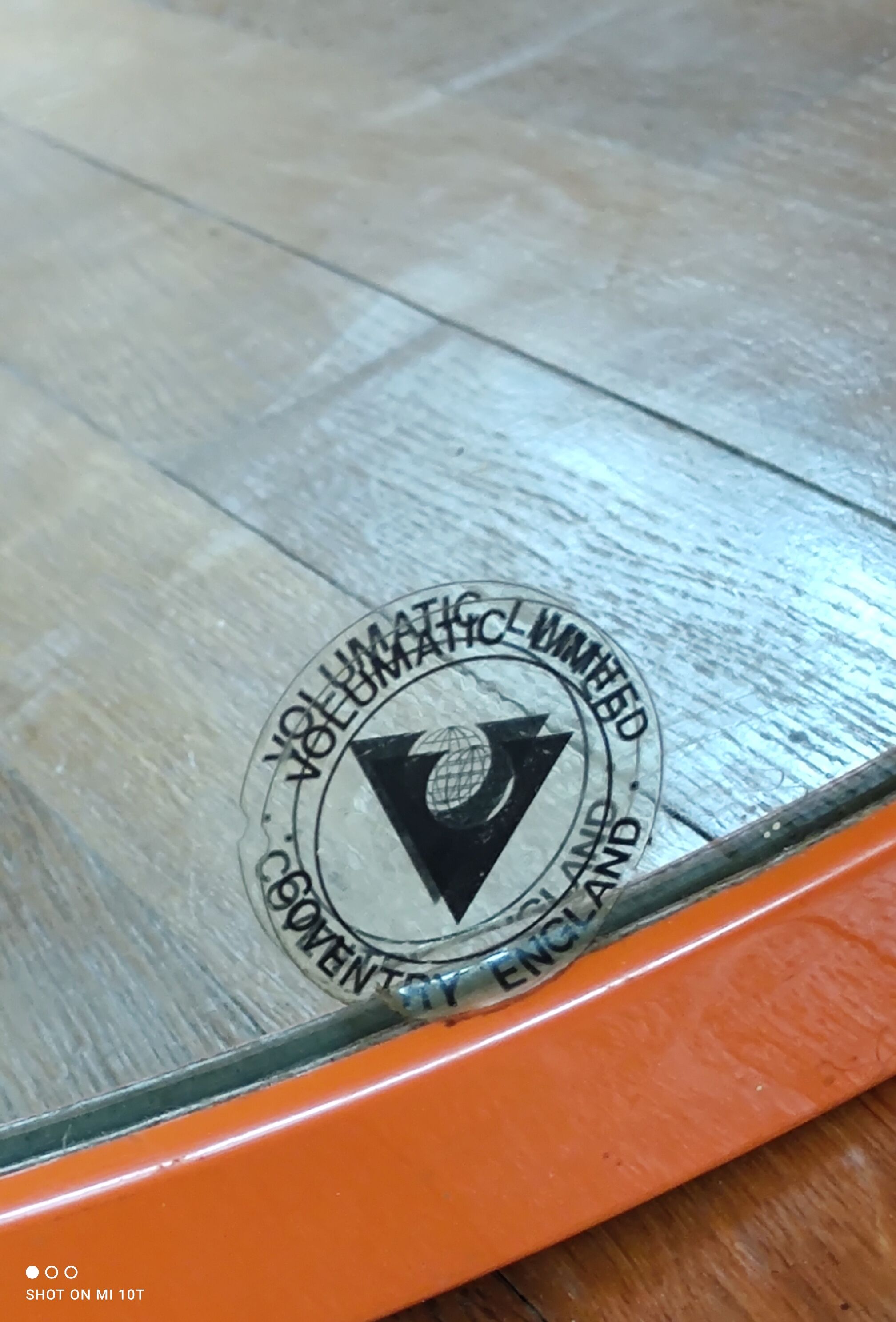 Convex vintage orange mirror