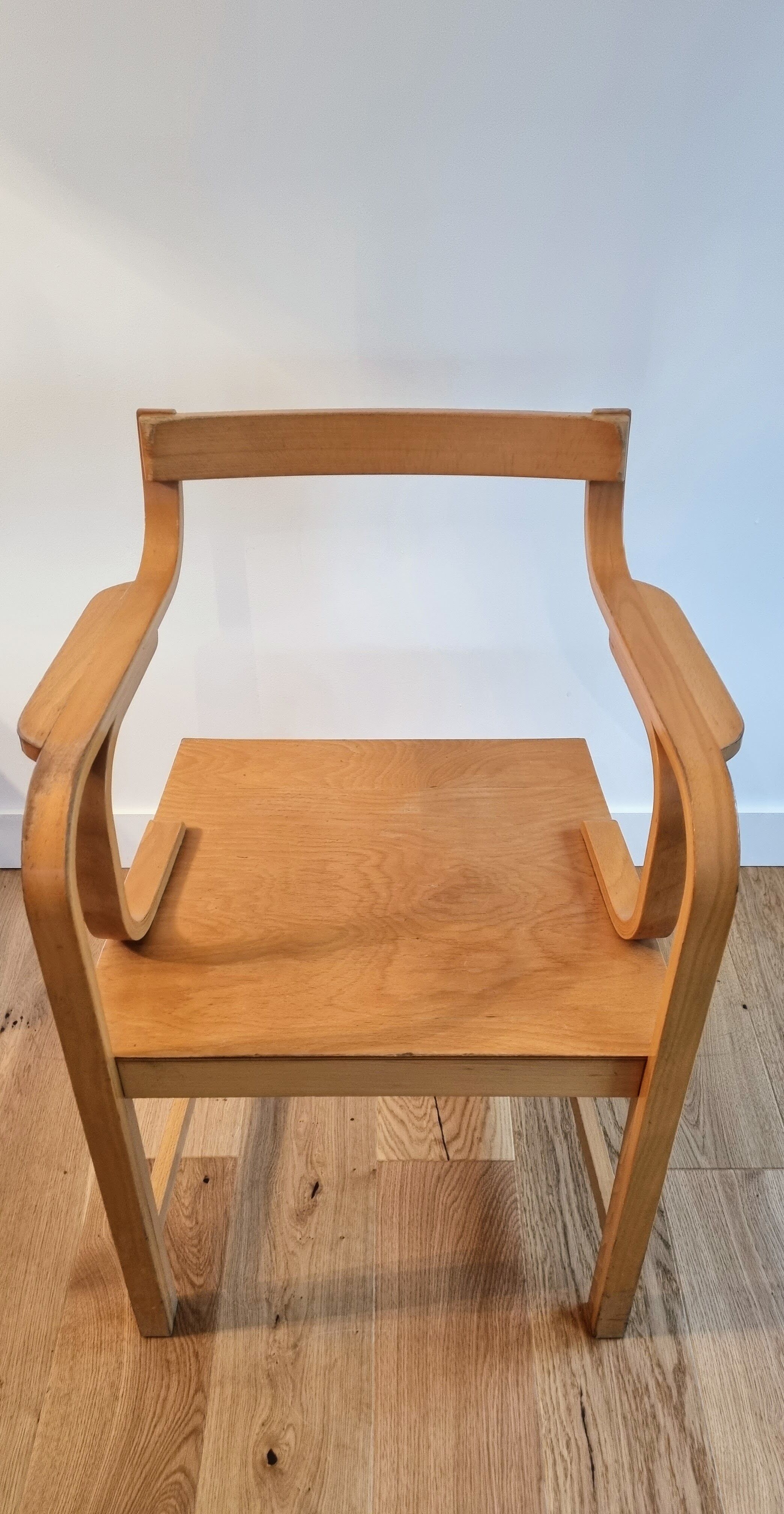 Vintage curved wood armchair