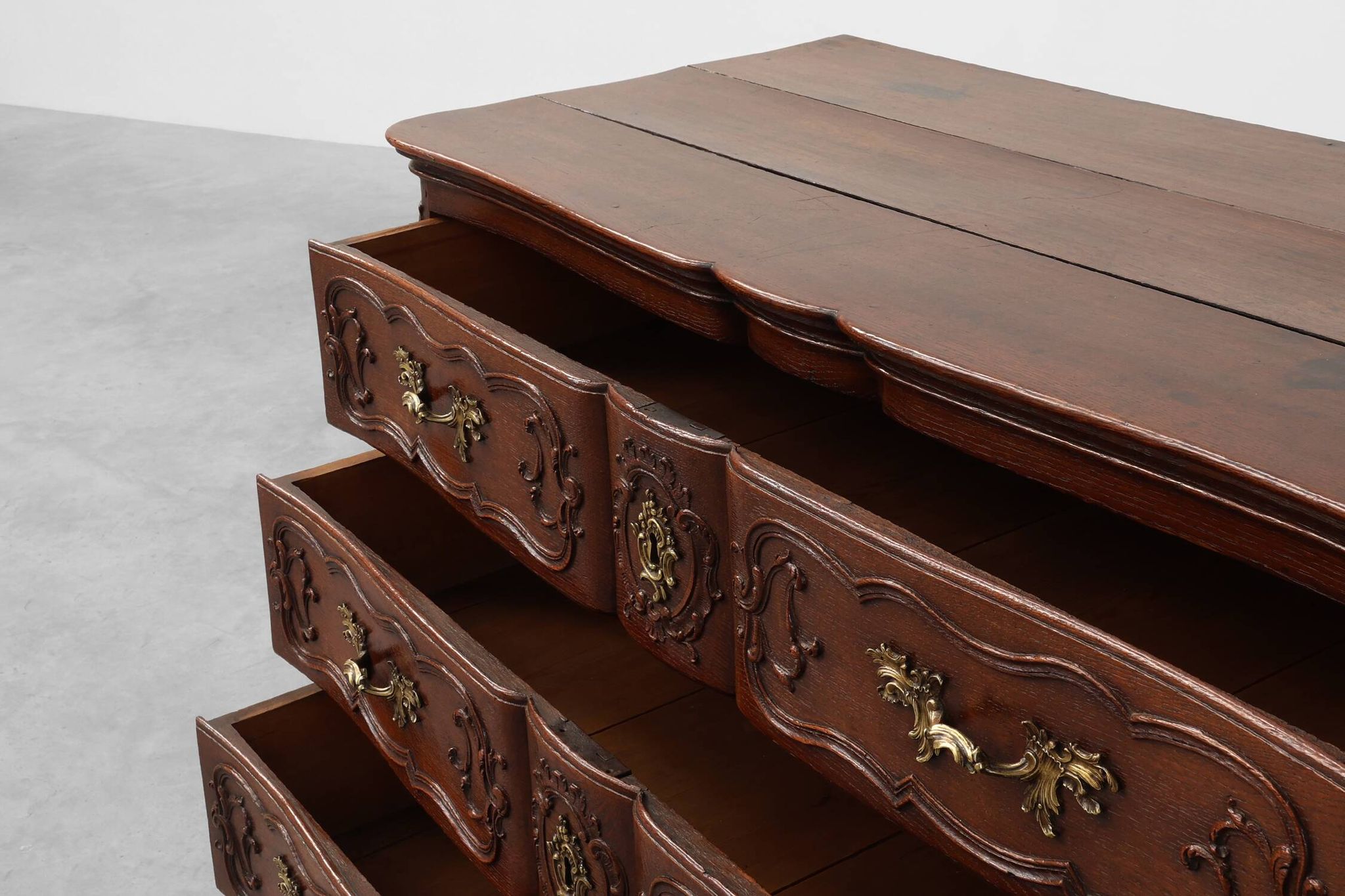 French 18th Century hand crafted oak chest of drawers in Louis XV style