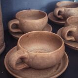 4 stoneware cups and sub-cups