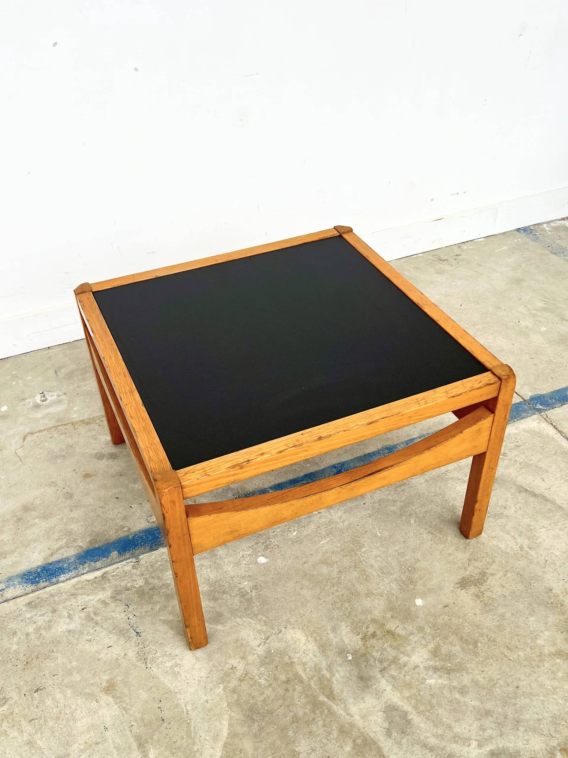 Baumann coffee table with black medium-density top