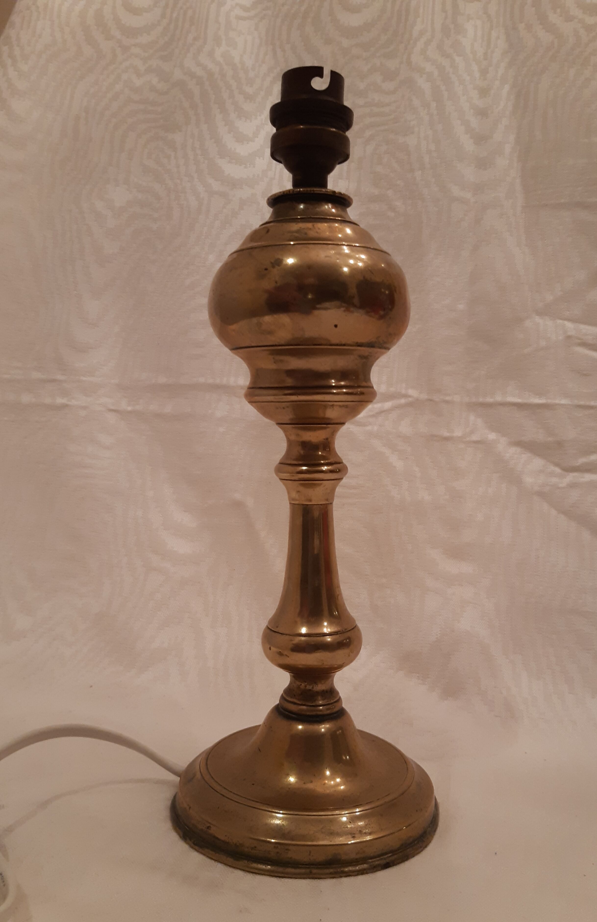 Old lamp foot in electrified brass