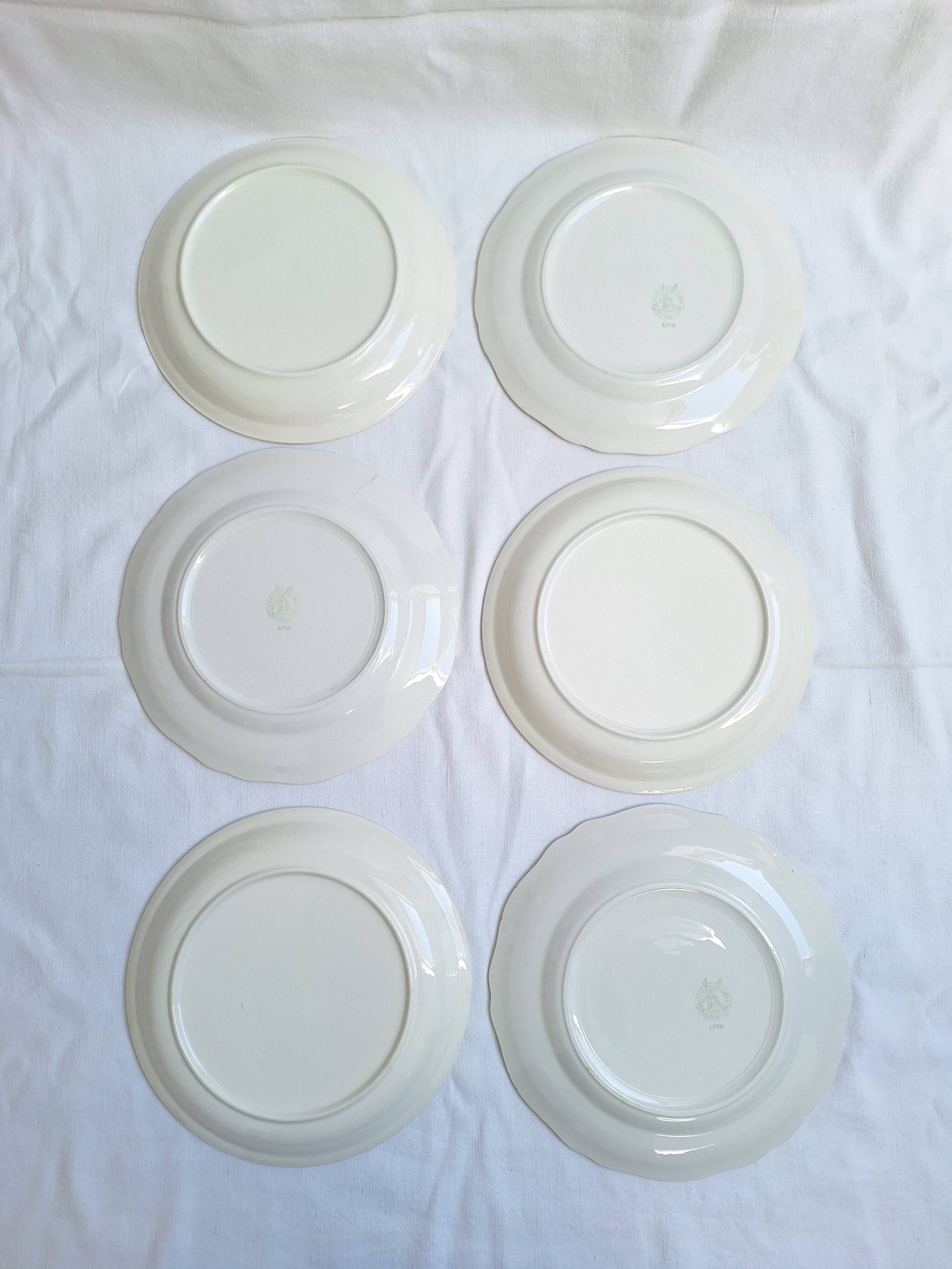 Vintage blue Moulin des Loups dinner plates