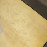 Table basse en laiton doré et verre fumé. Années 1970.