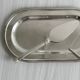 Foie gras set in shiny silver metal