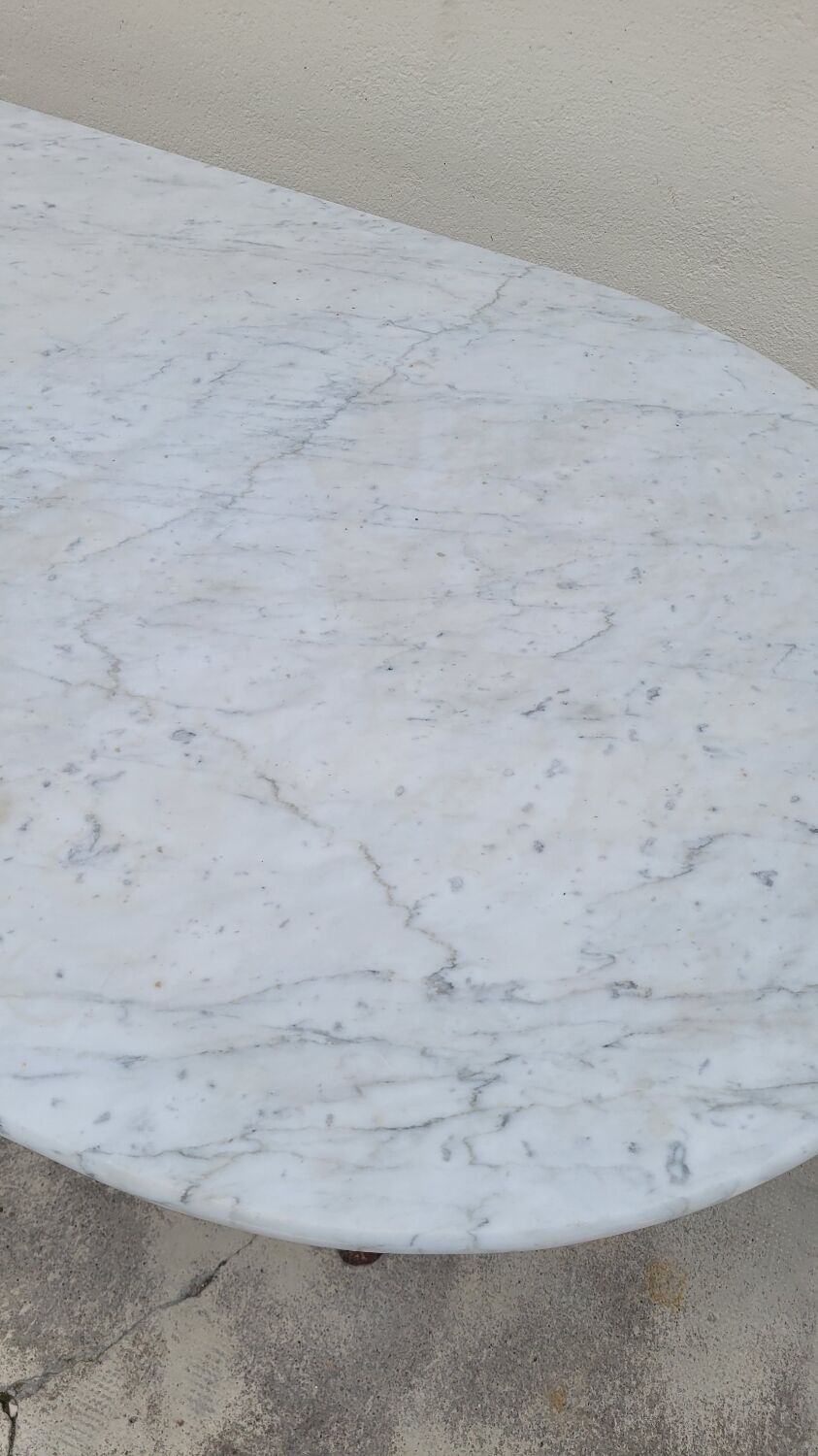 Restaurant bistro table in oval marble and decorated cast iron bases -1m51