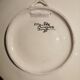 Decorative plate signed Maurice Fouillen.