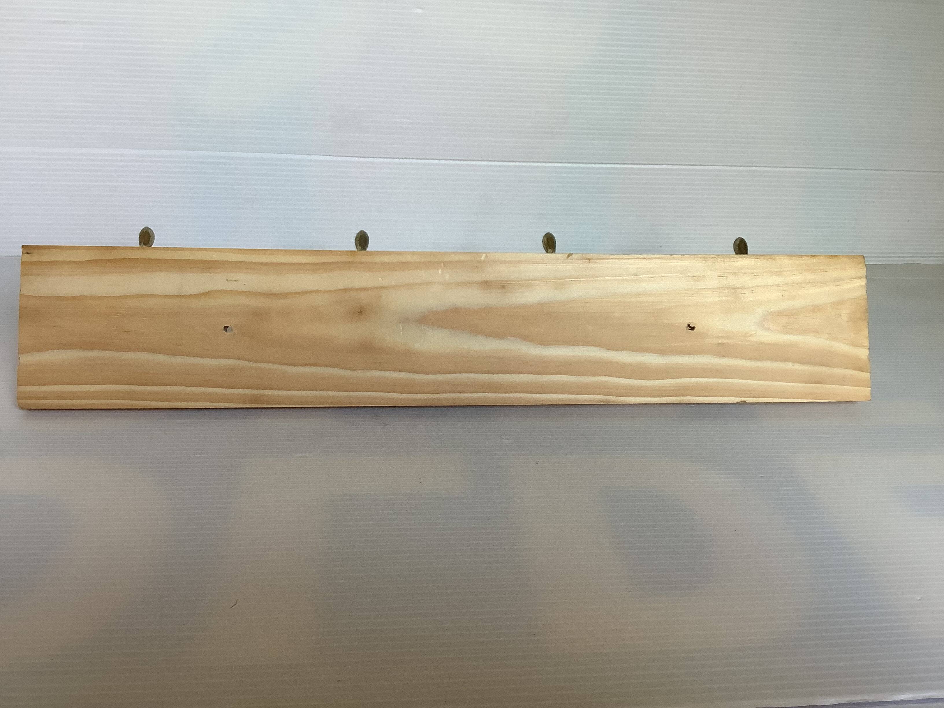 Wooden coat rack with four hooks