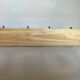 Wooden coat rack with four hooks