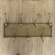Gold metal mesh wall coat rack
