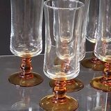 6 amber-footed champagne flutes in very good condition.