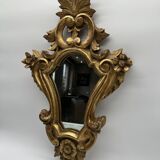 Wooden mirror with gilded stucco