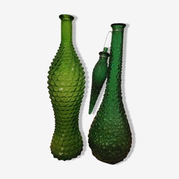 Set of green bubble glass bottles