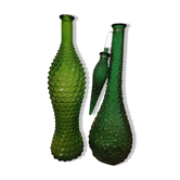 Set of green bubble glass bottles