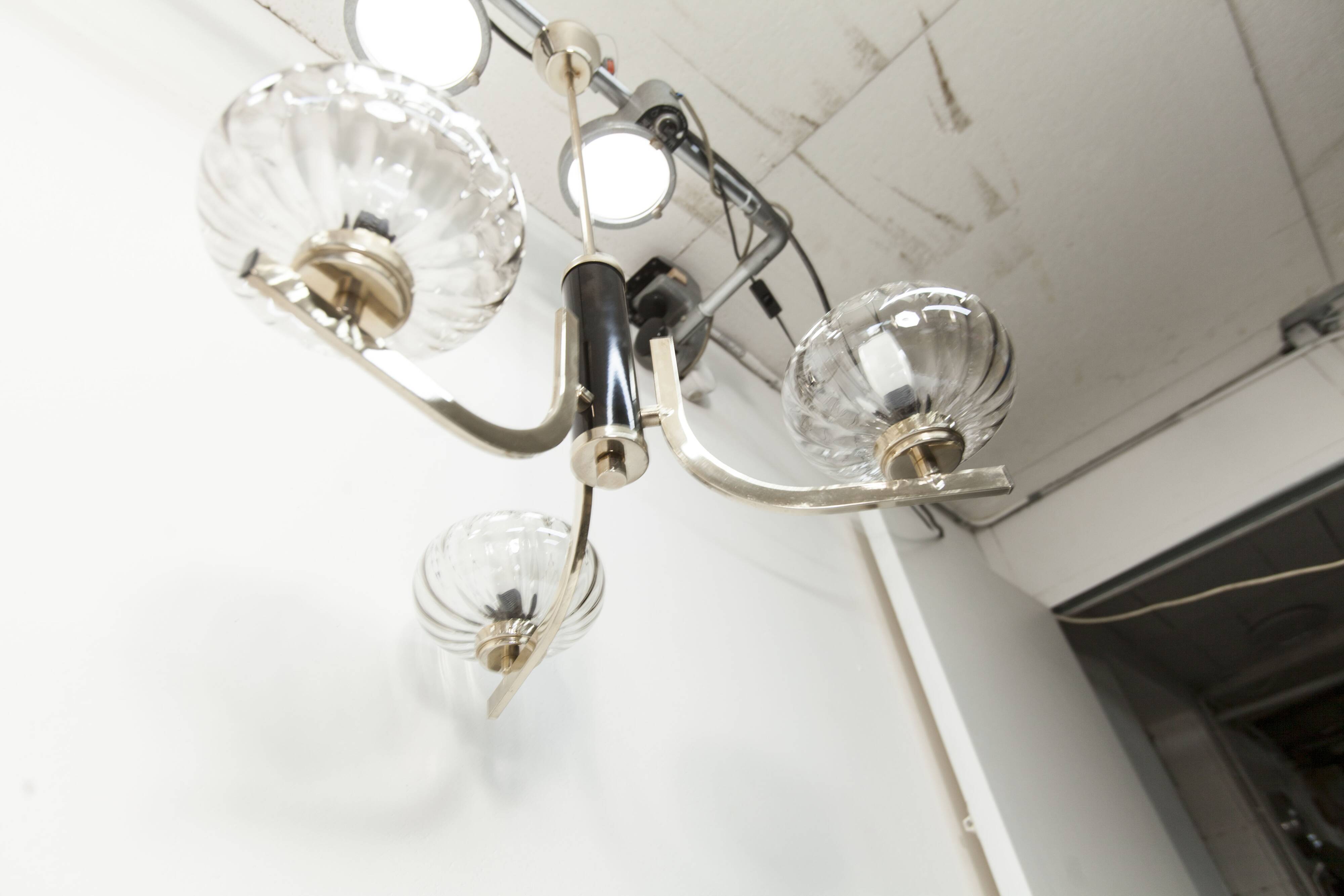 See Delmas chandelier, 3 arms, black and gold, clear glass, 1960