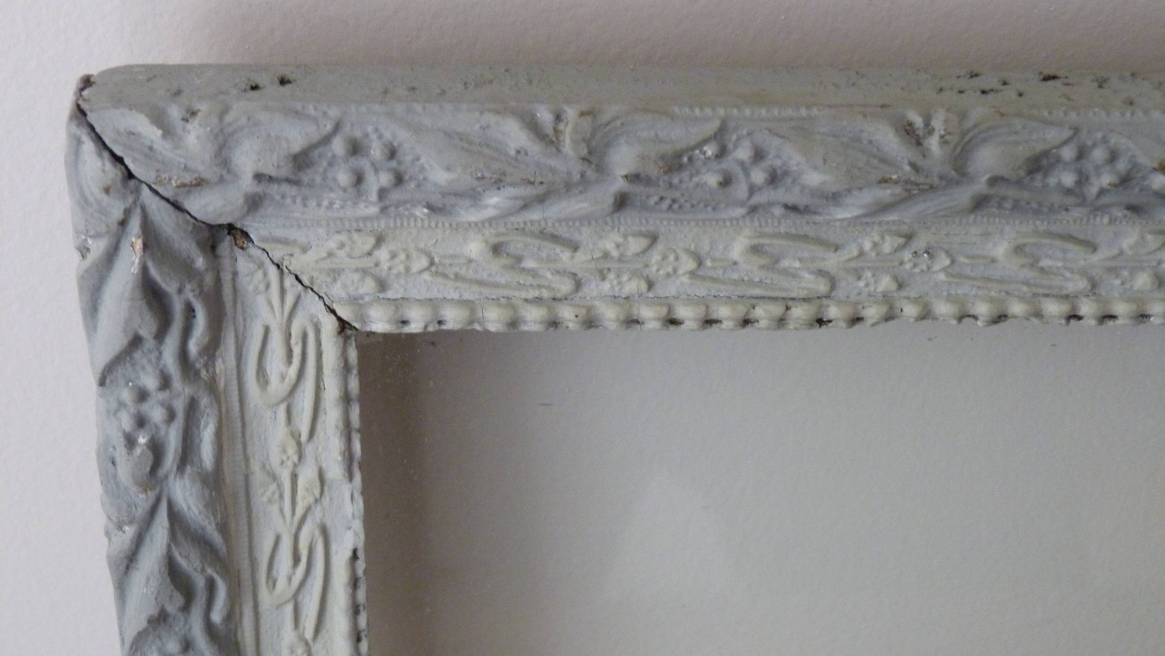 Patinated frame with glass