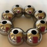 Silver flower vase in a crown shape.