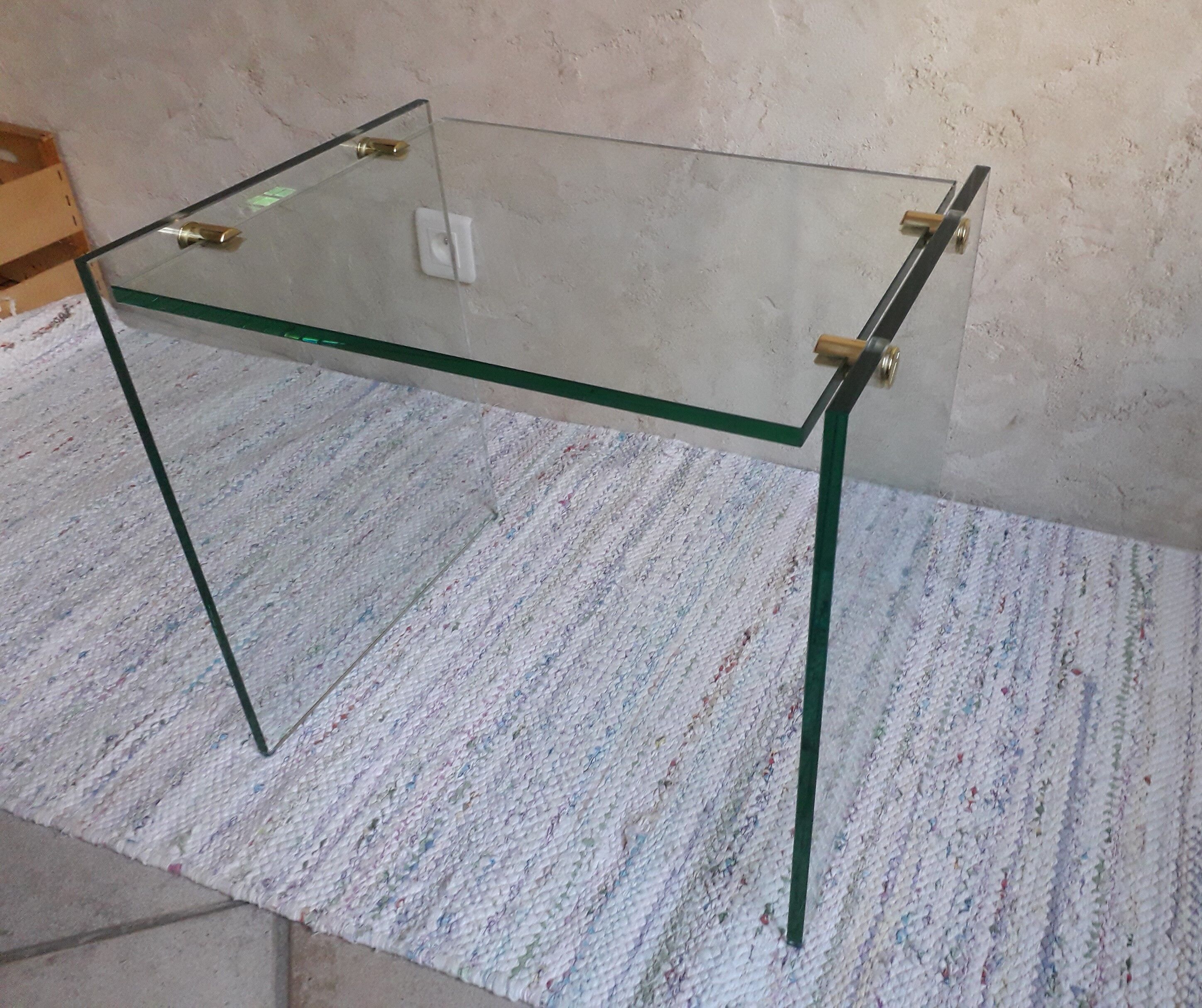 Glass and brass coffee table