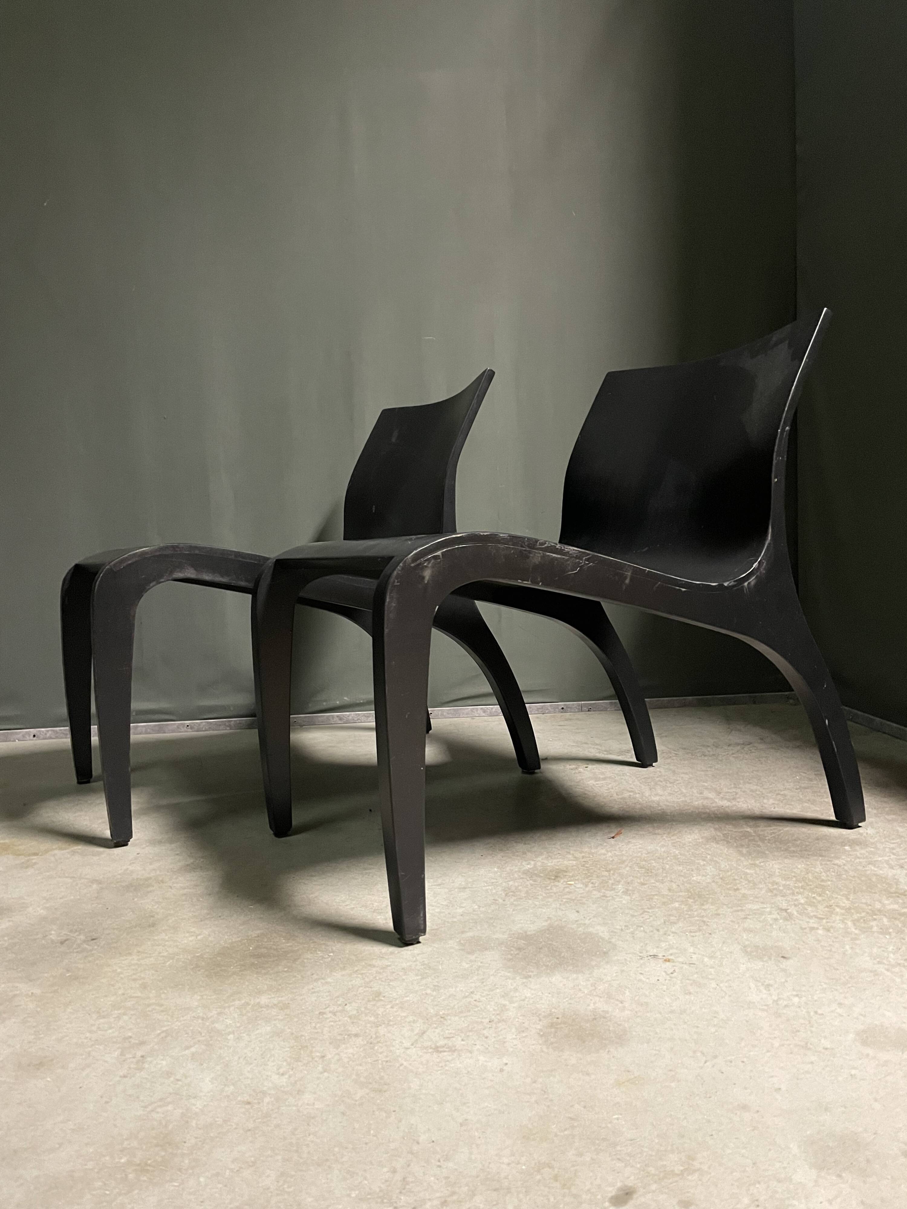 A pair Minimalist bent plywood lounge chairs