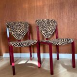 4 red lacquered zebra chairs