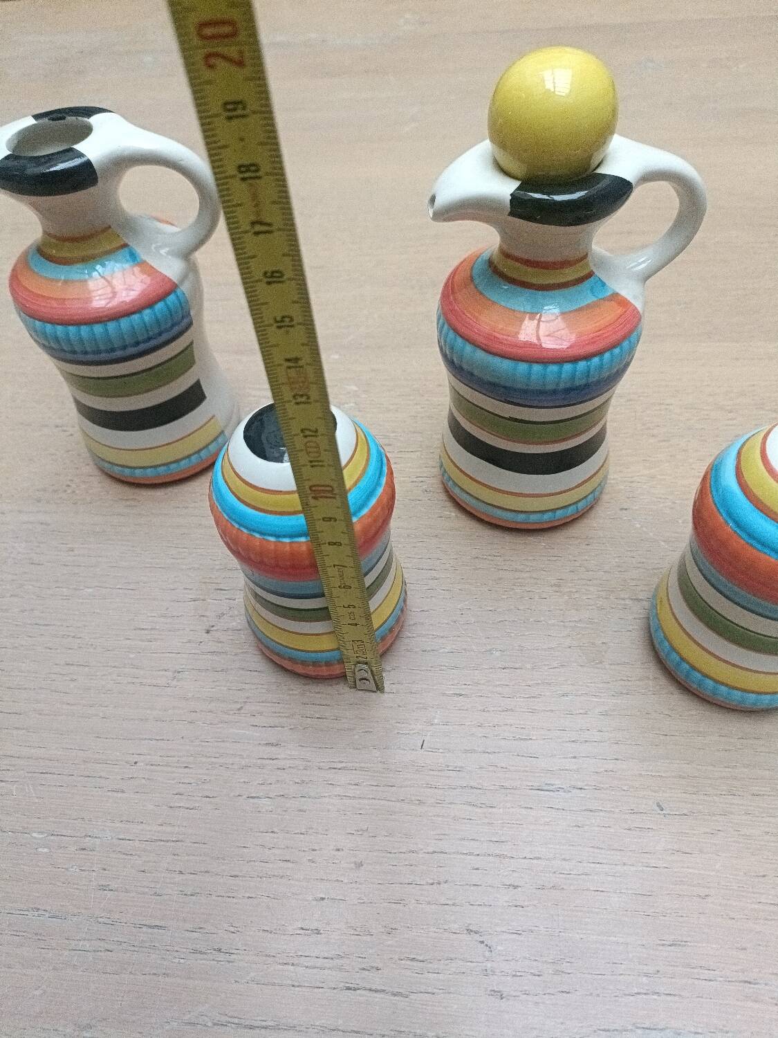 Vinegar and oil set, salt shaker and pepper shaker.