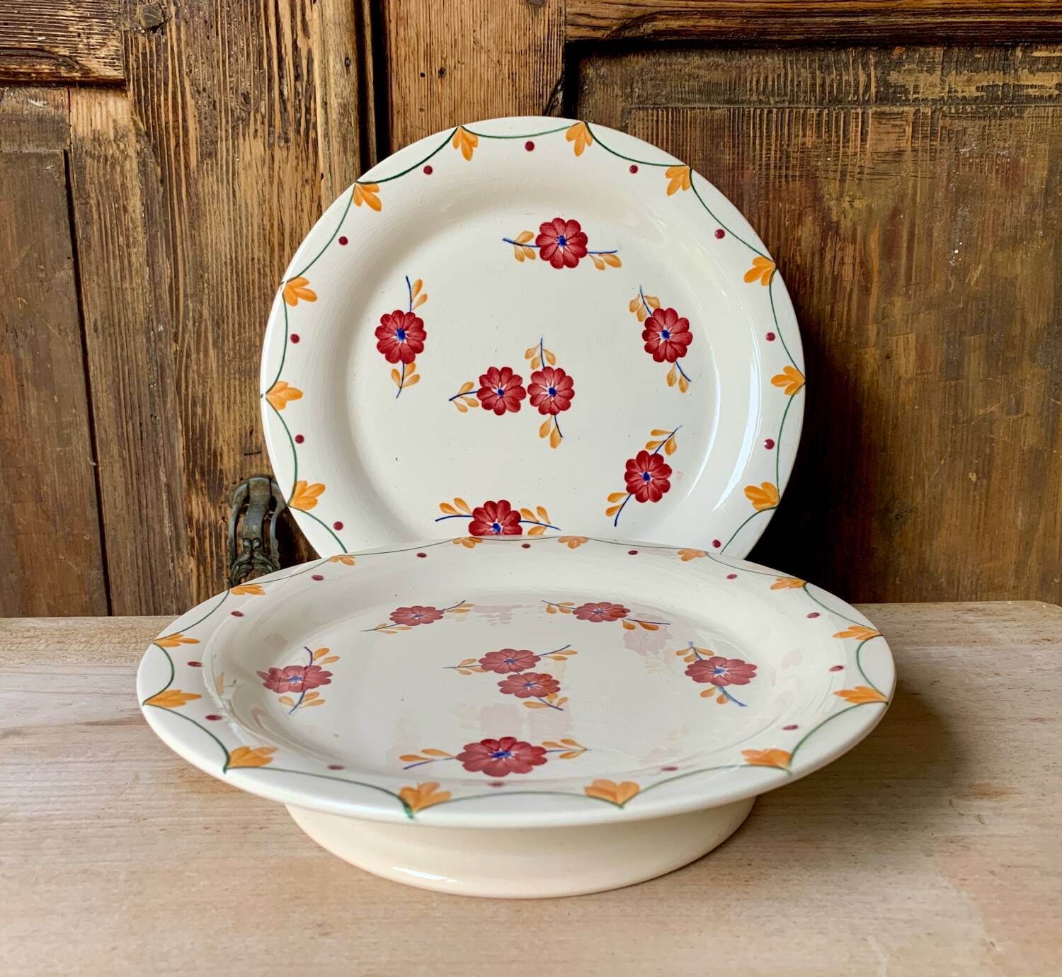 Two old Longwy Bagdad pedestal plates