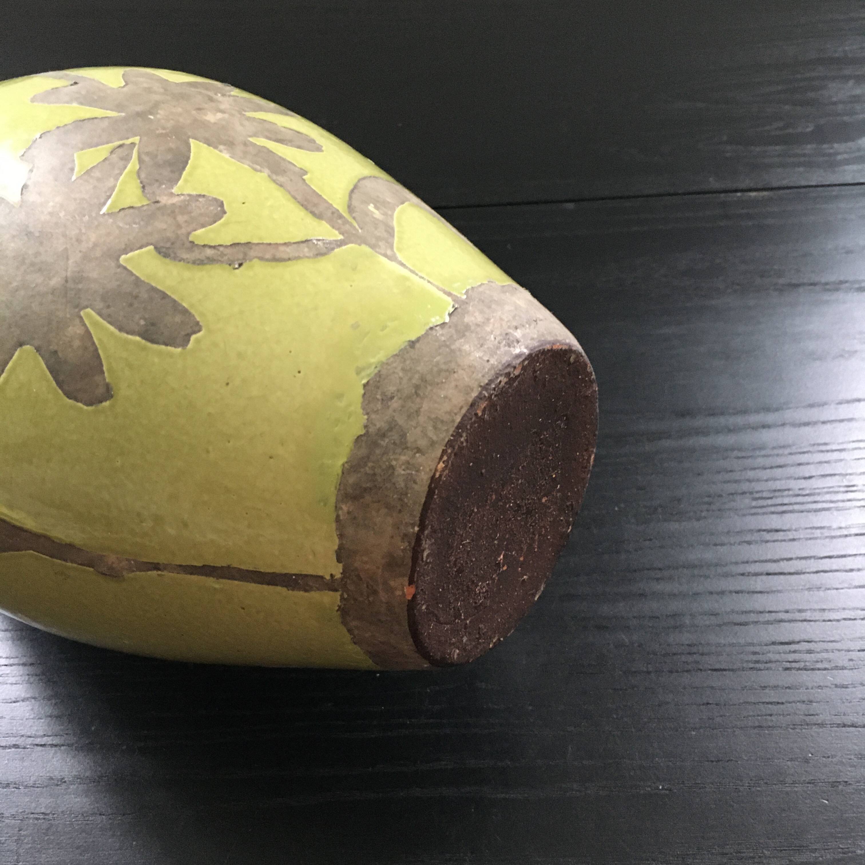 Large green vase with floral decoration