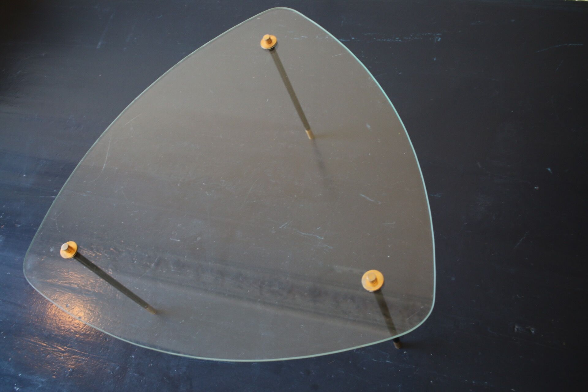 Vintage glass and black-painted brass side table