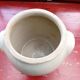 Off-white sandstone pot