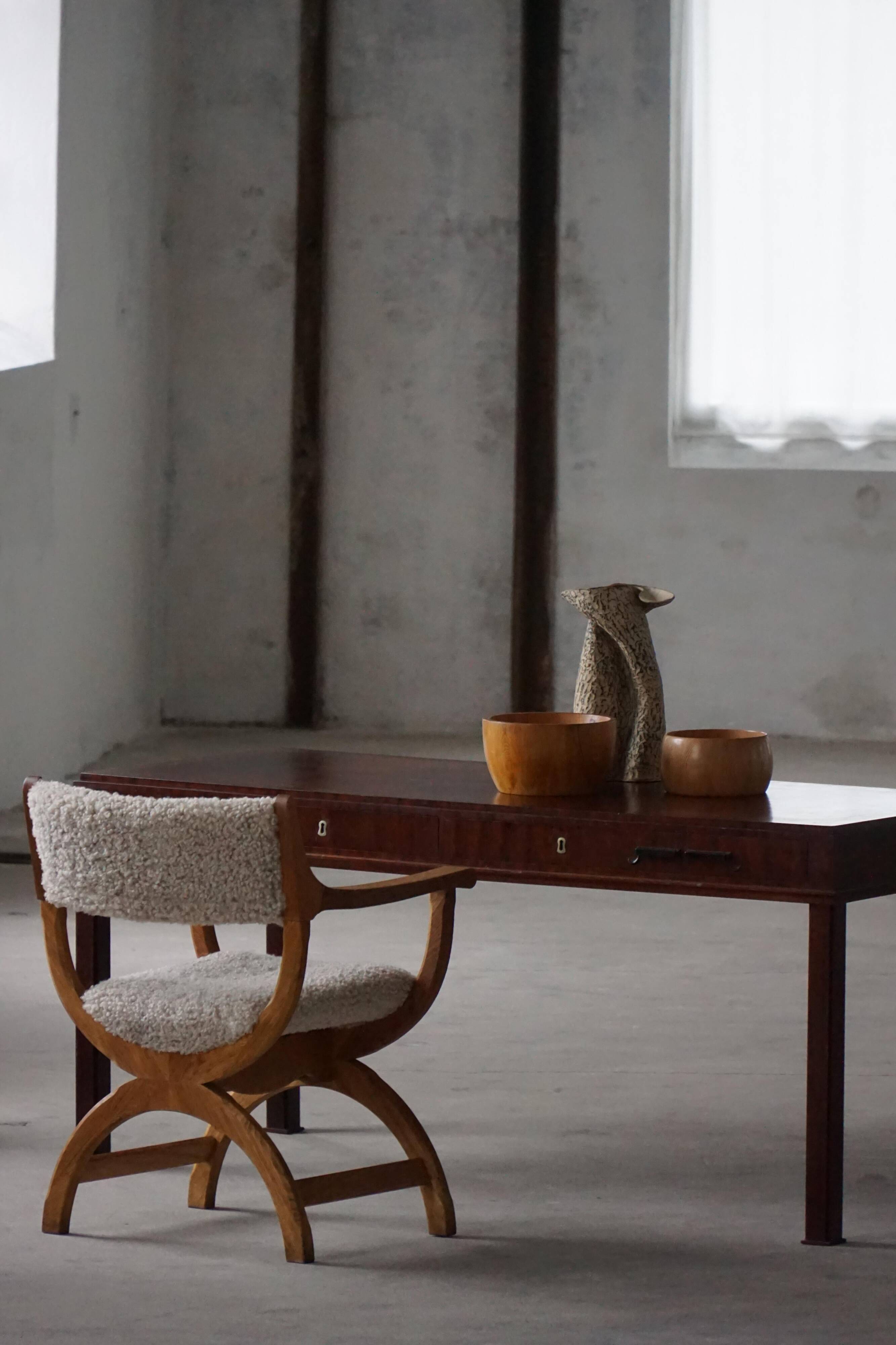 Mid-20th century mahogany writing desk by a Danish cabinetmaker, 1950s.