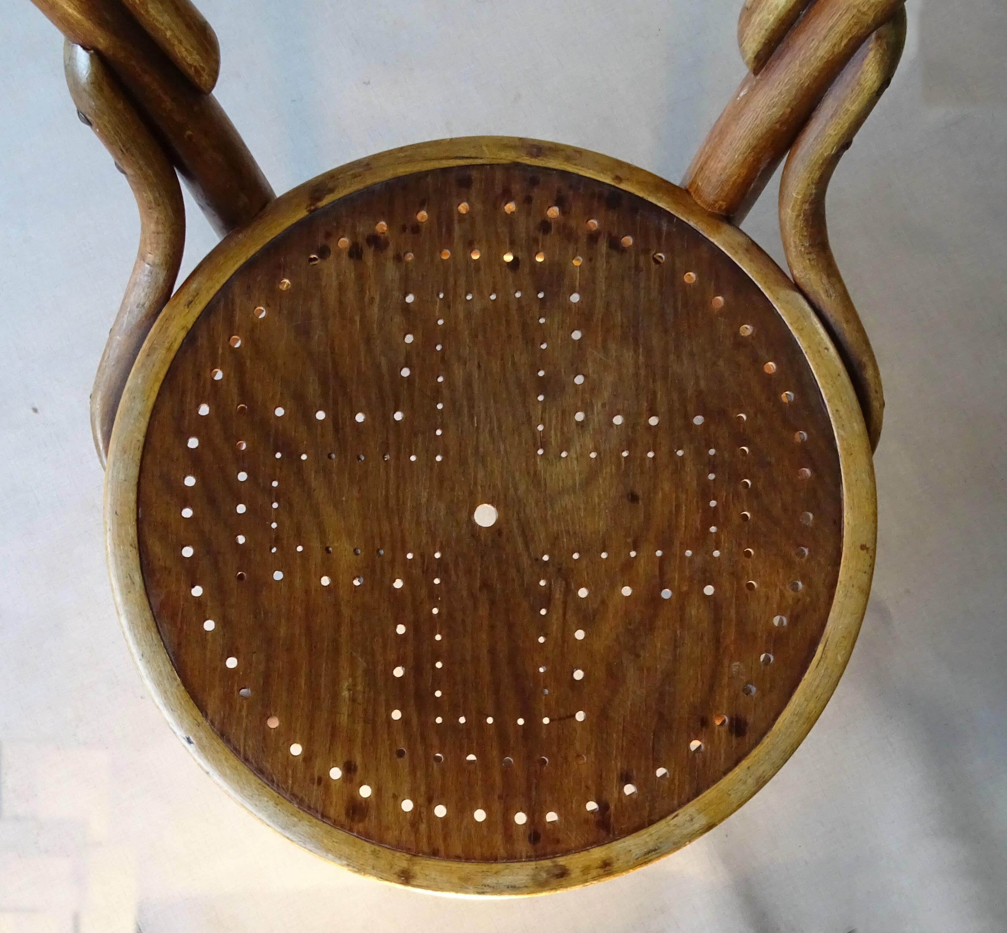 2 chairs n°14 - 1/2 by Kohn 1905, perforated wooden seats