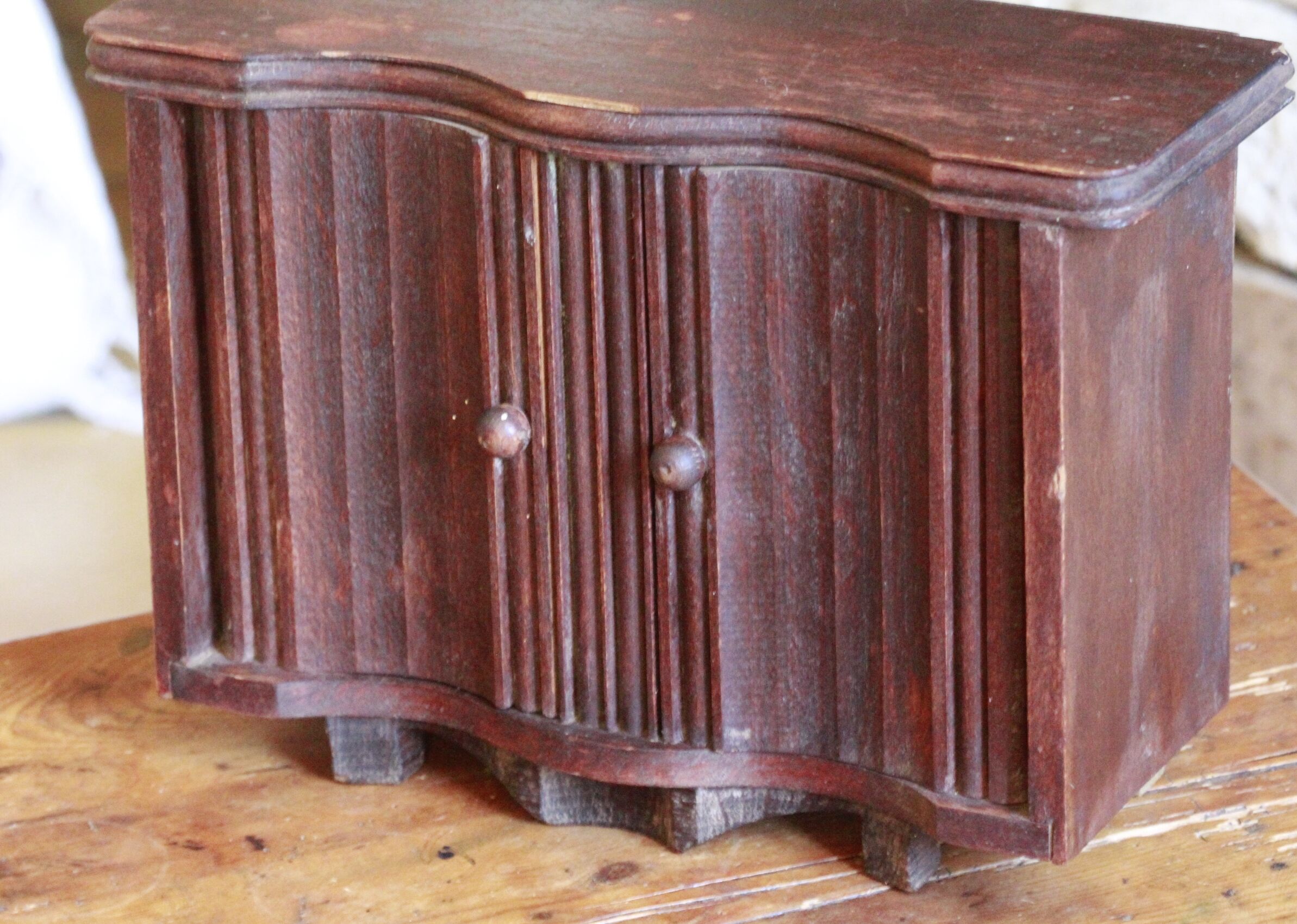 Old wooden doll sideboard