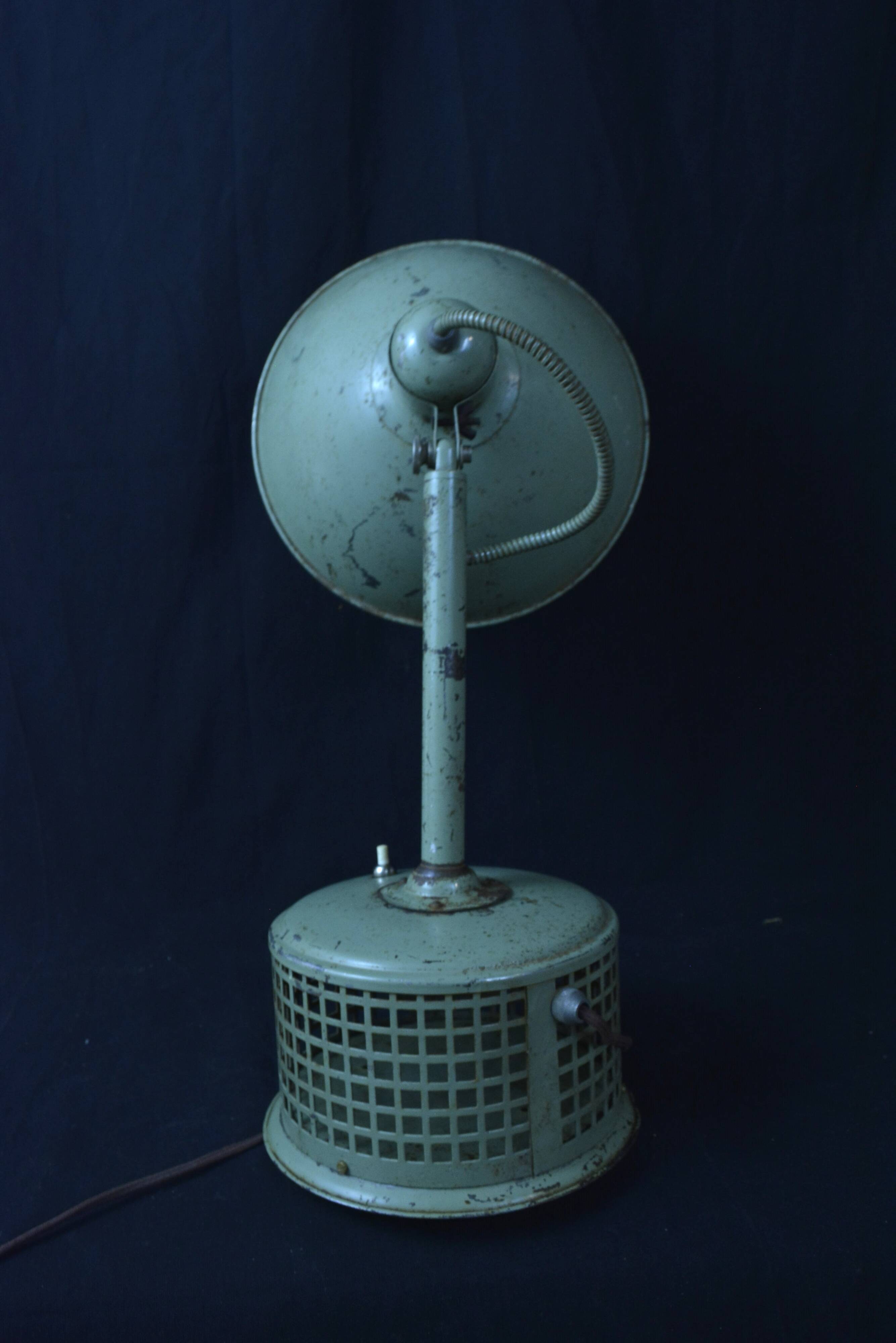 Industrial metal parabola lamp.