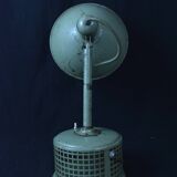 Industrial metal parabola lamp.