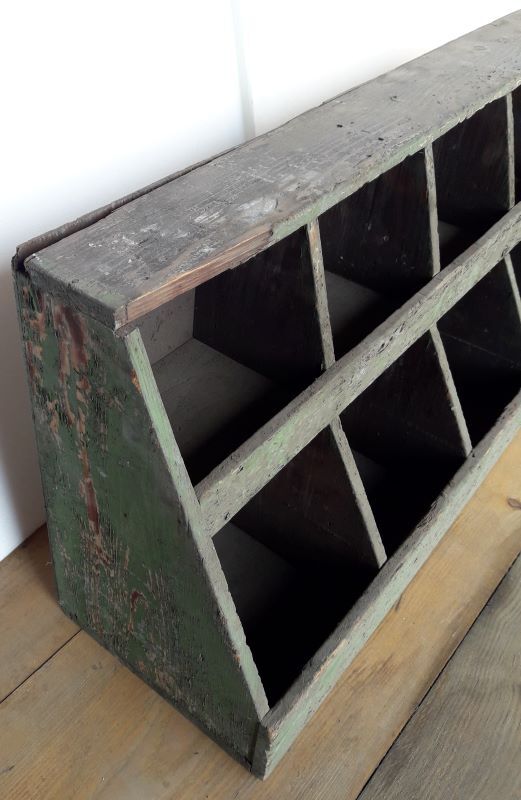 Locker, old workshop shelf in wooden compartments