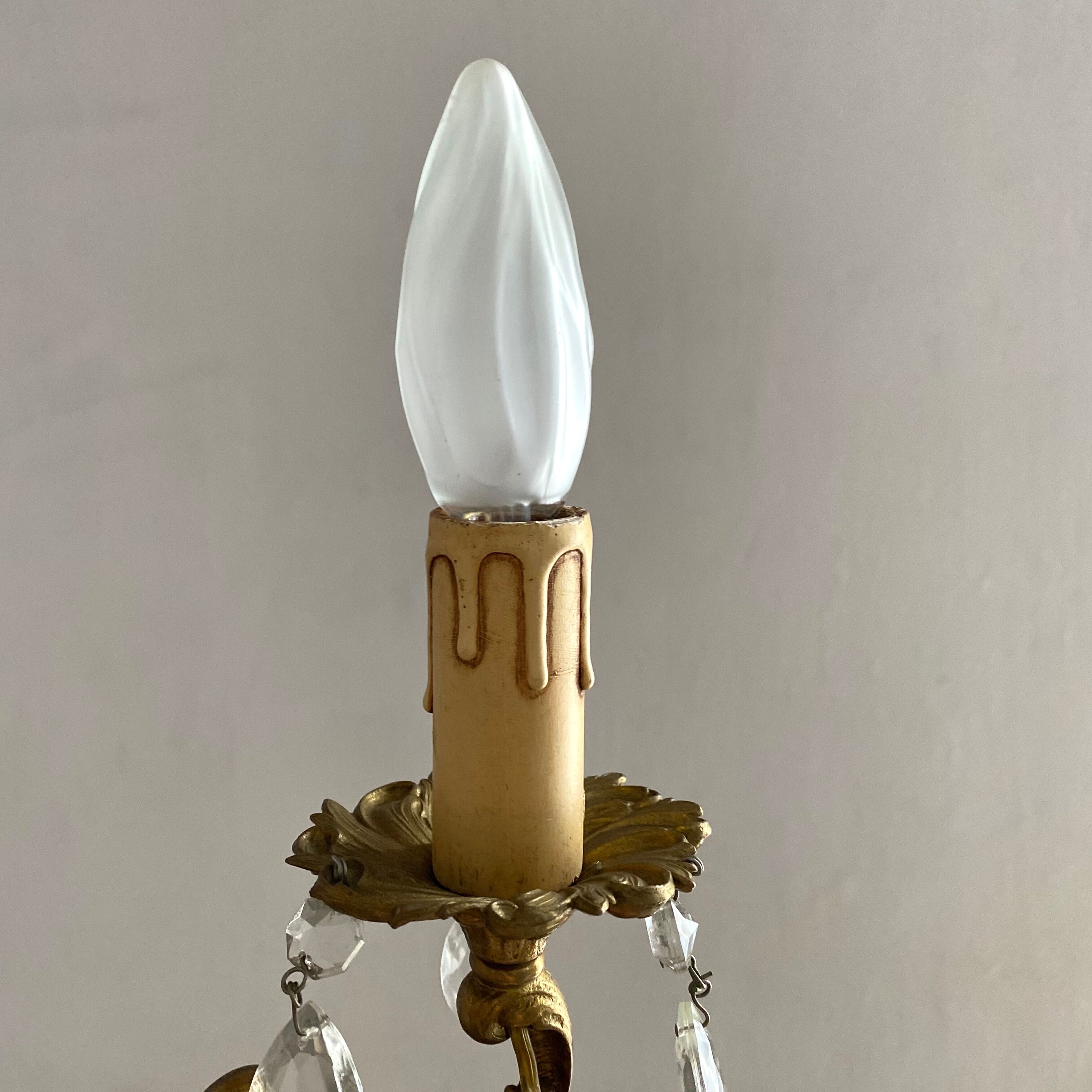 Chandelier with tassels and brass