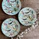 Set of 3 antique plates in majolica with bird designs.