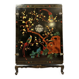 Chinese cabinet in black lacquer and colored decorations