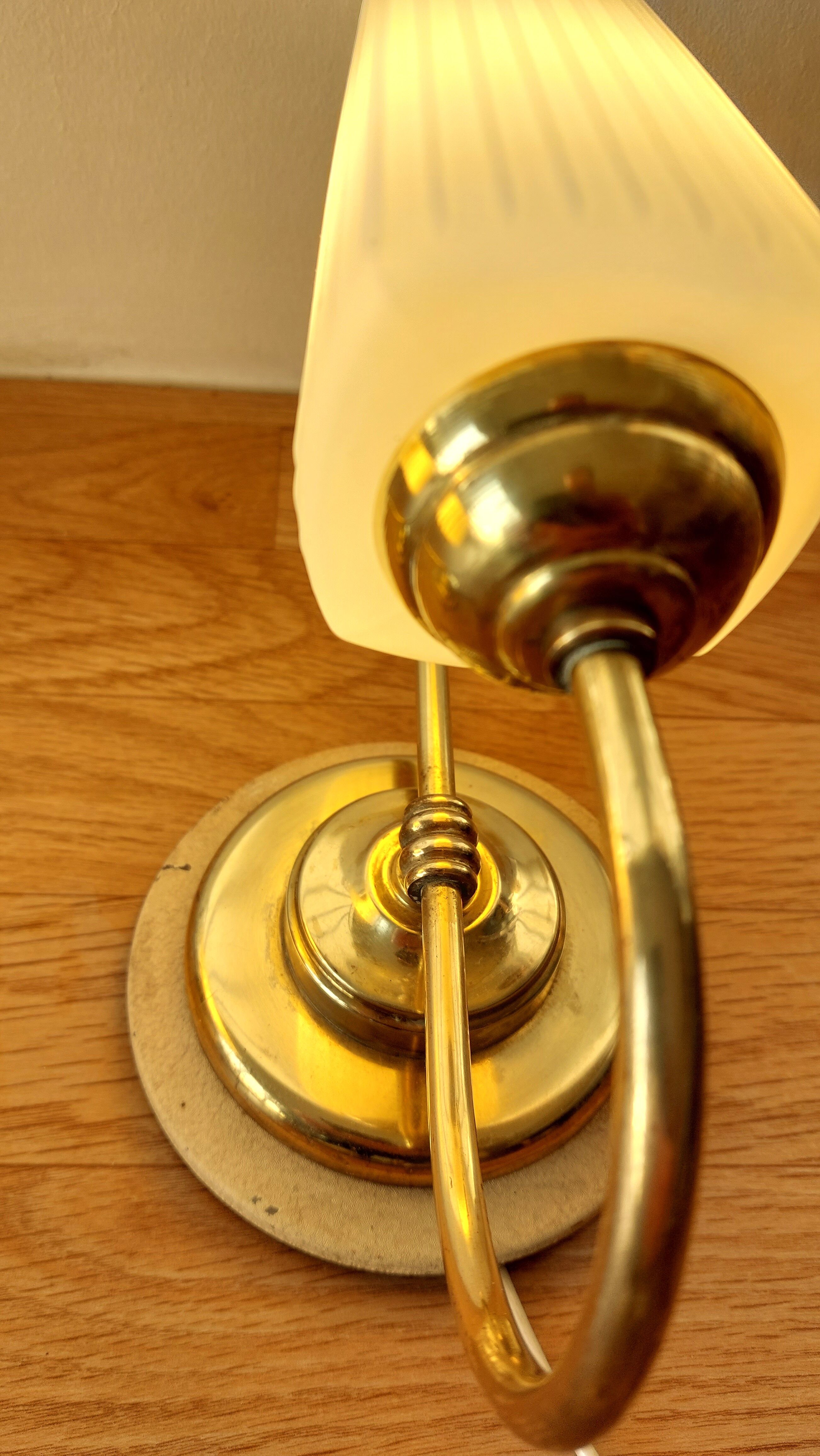 Pair of sconces with a light arm, brass and white opaline 1960.