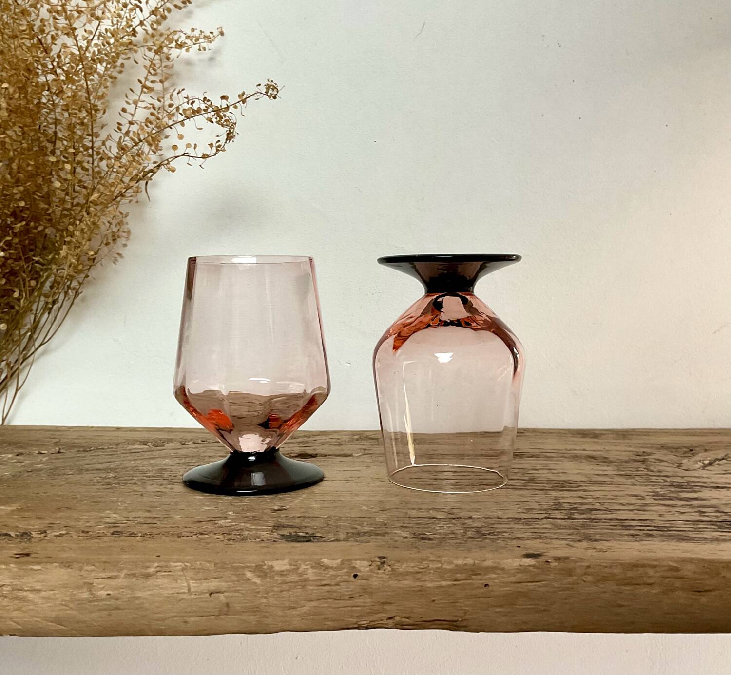 6 small pink glasses with black stem