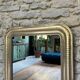 Antique Louis Philippe mirror with silver leaf pearls 105cm