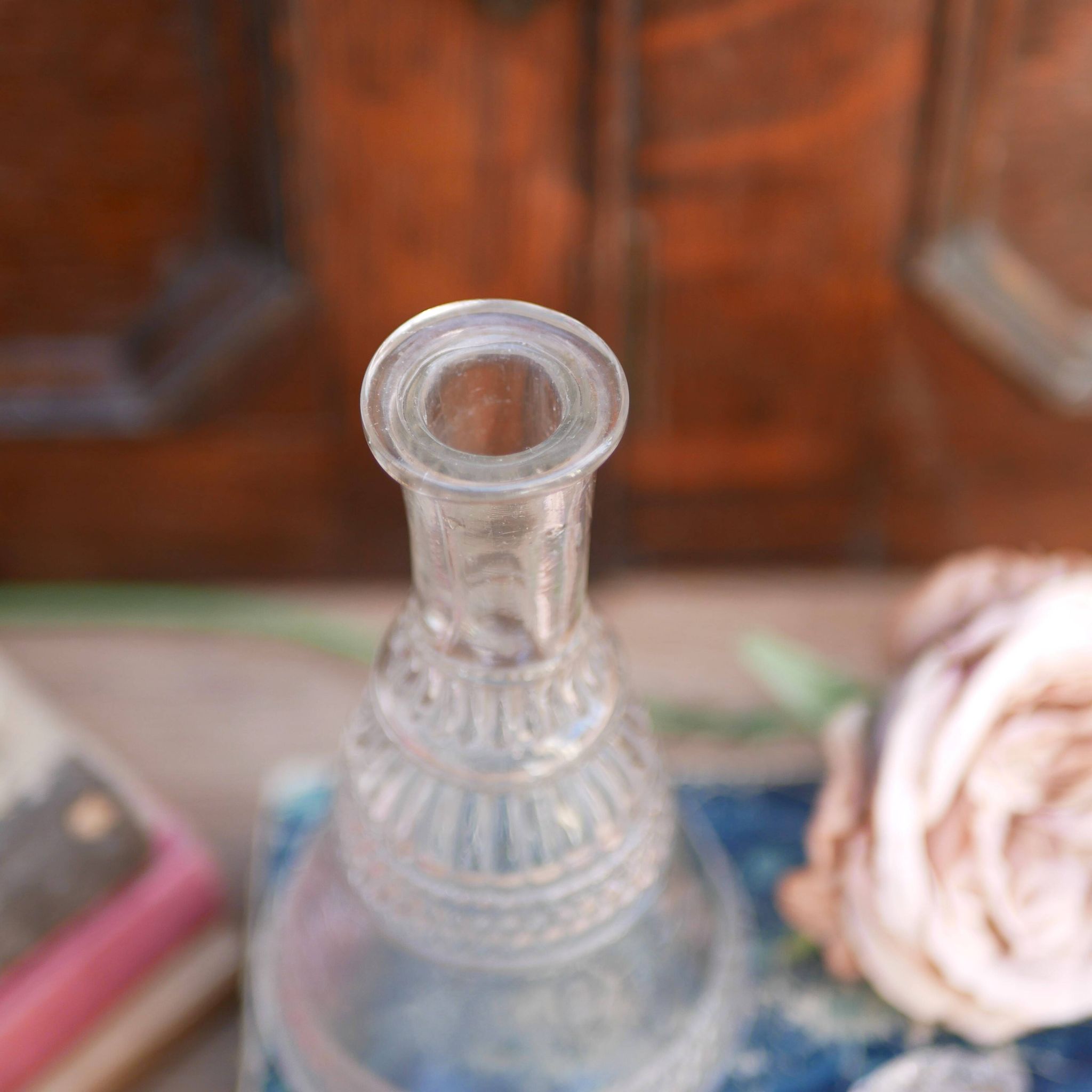 Cut glass liqueur decanter with decorated stopper