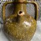 Khaki green glazed terracotta oil jar, 18th-19th century